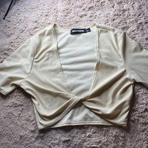 MissyEmpire nude twisted low cut crop top